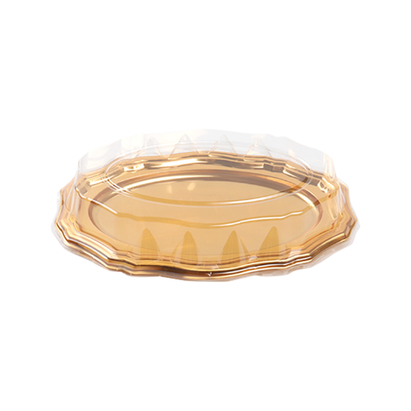 Kultainen muovinen kakkupelti